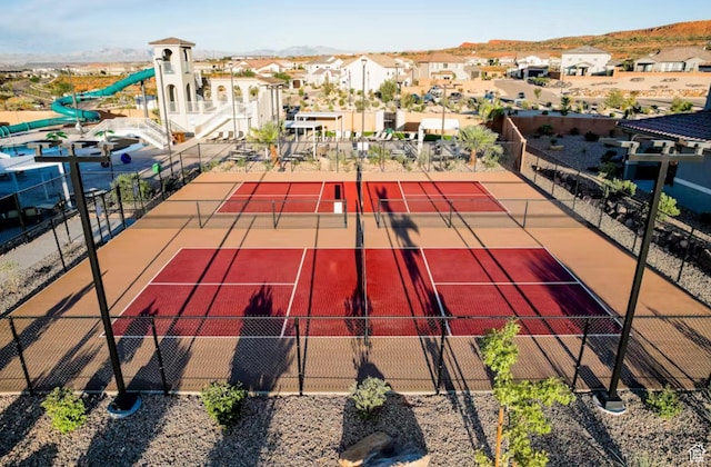 1427 N Rustico Dr, Washington, UT 84780 - view of tennis court featuring fence and a mountain view