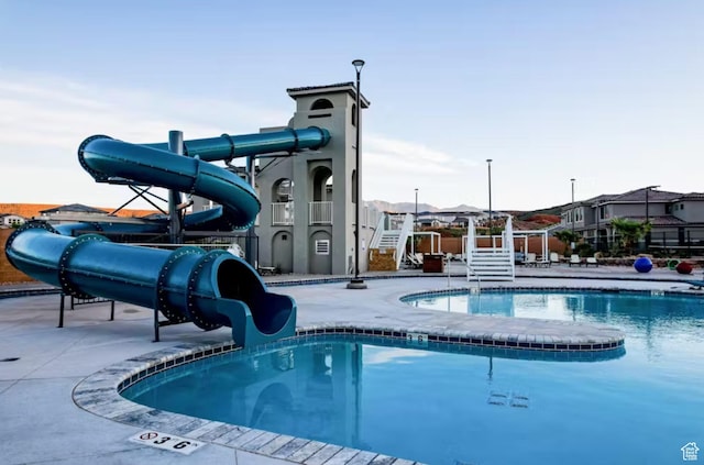 1427 N Rustico Dr, Washington, UT 84780 - community pool with a water slide