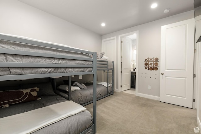 1427 N Rustico Dr, Washington, UT 84780 - bedroom featuring light carpet, baseboards, recessed lighting, and ensuite bath