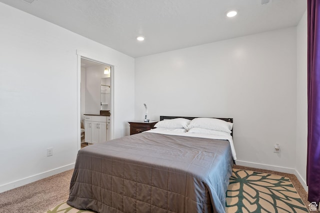 bedroom featuring connected bathroom, recessed lighting, carpet, and baseboards