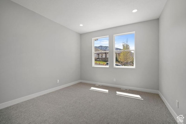2275 E Meadowlark Ln N, North Logan, UT 84341 - carpeted spare room with recessed lighting, visible vents, and baseboards
