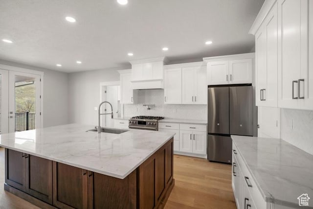 2275 E Meadowlark Ln N, North Logan, UT 84341 - kitchen featuring appliances with stainless steel finishes, tasteful backsplash, recessed lighting, and a sink