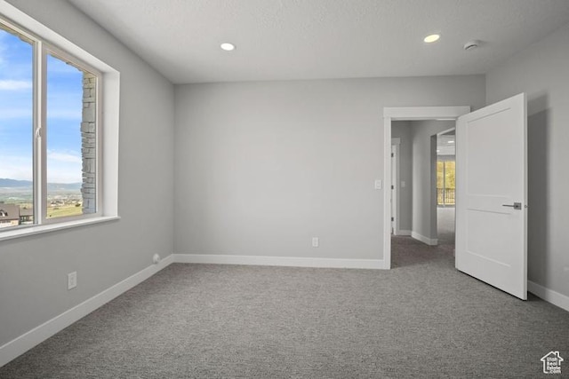 2275 E Meadowlark Ln N, North Logan, UT 84341 - carpeted empty room featuring recessed lighting and baseboards