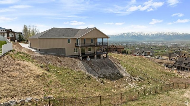 2275 E Meadowlark Ln N, North Logan, UT 84341 - rear view of property with fence and a deck