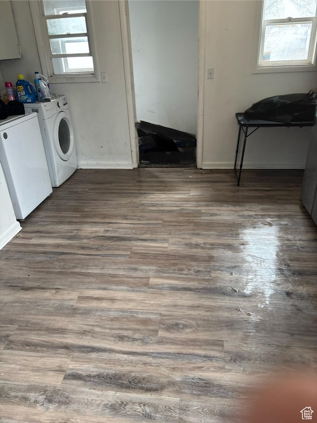 280 N Main St, Smithfield, UT 84335 - washroom with separate washer and dryer, cabinet space, baseboards, and dark wood-type flooring