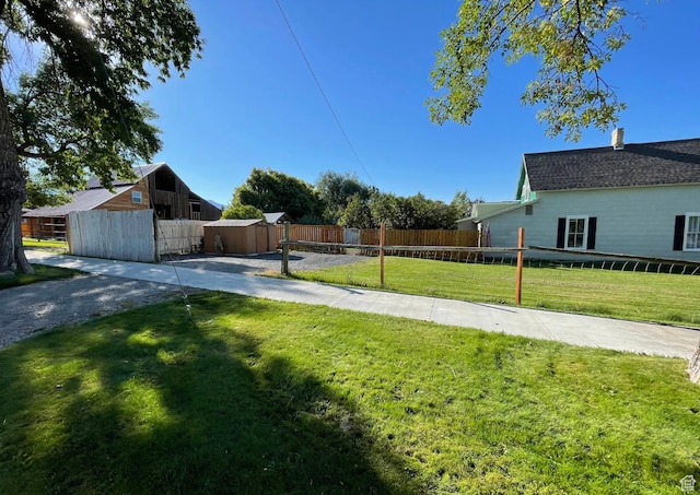 280 N Main St, Smithfield, UT 84335 - view of yard featuring an outbuilding, a storage shed, and fence