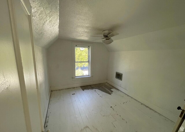 280 N Main St, Smithfield, UT 84335 - additional living space featuring lofted ceiling, a textured ceiling, ceiling fan, visible vents, and baseboards