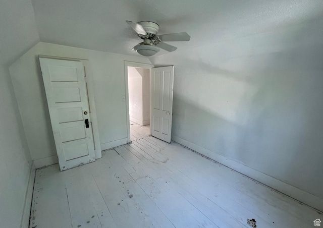 280 N Main St, Smithfield, UT 84335 - unfurnished bedroom with baseboards, a ceiling fan, lofted ceiling, and light wood finished floors