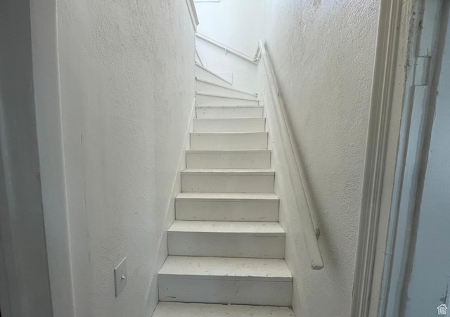 280 N Main St, Smithfield, UT 84335 - staircase featuring a textured wall