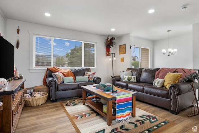 501 Valley View Dr, Tooele, UT 84074 - living area with a chandelier, recessed lighting, and light wood-style flooring