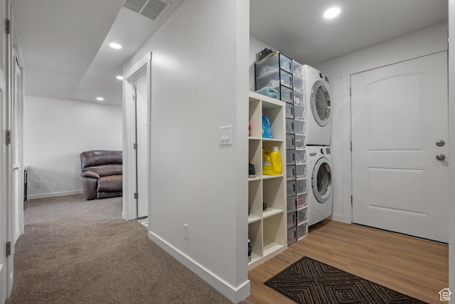 501 Valley View Dr, Tooele, UT 84074 - laundry room with recessed lighting, stacked washer / drying machine, laundry area, baseboards, and visible vents