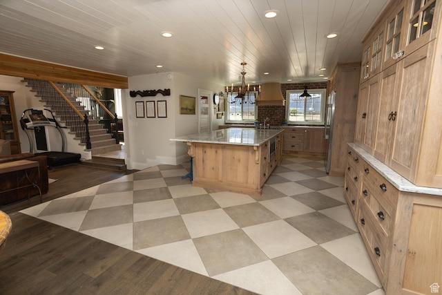 815 S Annabella Rd, Richfield, UT 84701 - kitchen with recessed lighting, wooden ceiling, light brown cabinets, glass insert cabinets, and a spacious island