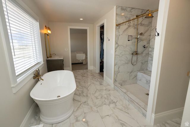 815 S Annabella Rd, Richfield, UT 84701 - bathroom with a marble finish shower, marble finish floor, a freestanding bath, and vanity
