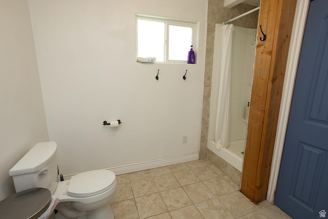 815 S Annabella Rd, Richfield, UT 84701 - full bathroom featuring tiled shower, toilet, and tile patterned flooring