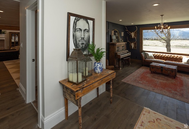 815 S Annabella Rd, Richfield, UT 84701 - living area featuring a notable chandelier, recessed lighting, dark wood-style flooring, and baseboards