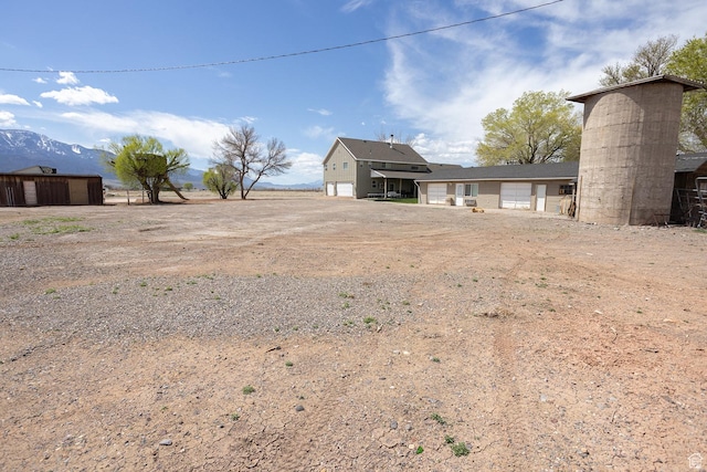 815 S Annabella Rd, Richfield, UT 84701 - view of yard featuring a detached garage and dirt driveway