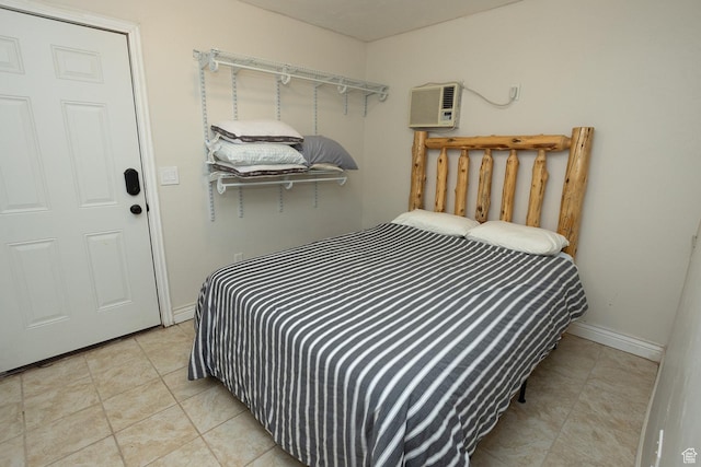 815 S Annabella Rd, Richfield, UT 84701 - bedroom featuring light tile patterned flooring, a wall mounted AC, and baseboards
