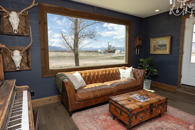 815 S Annabella Rd, Richfield, UT 84701 - living area featuring wood finished floors, recessed lighting, a notable chandelier, and baseboards