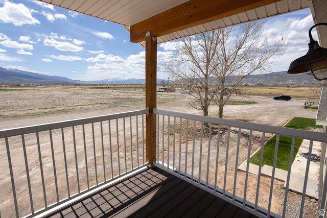 815 S Annabella Rd, Richfield, UT 84701 - wooden terrace with a mountain view and a rural view