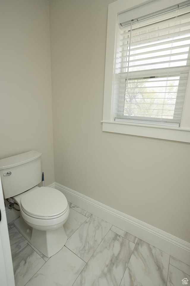 815 S Annabella Rd, Richfield, UT 84701 - bathroom with toilet, marble finish floor, and baseboards