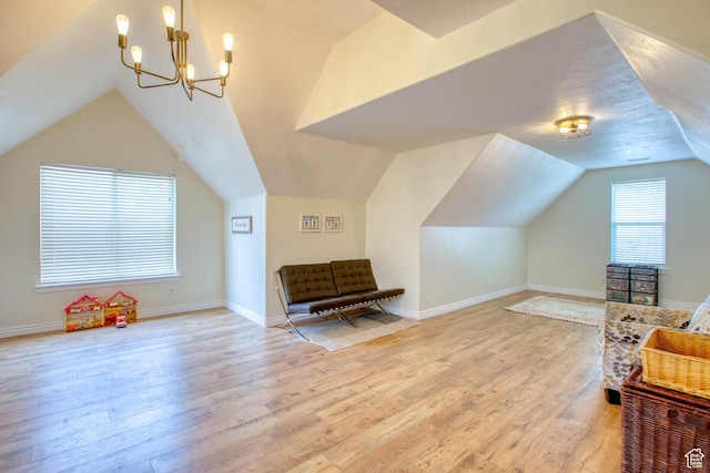 431 W 3460 N, Erda, UT 84074 - bonus room featuring baseboards, light wood-type flooring, an inviting chandelier, and lofted ceiling