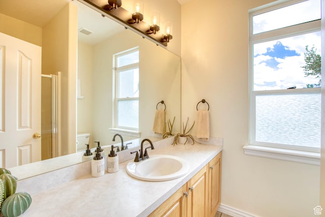431 W 3460 N, Erda, UT 84074 - full bathroom with visible vents, a shower stall, toilet, and vanity