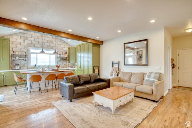 431 W 3460 N, Erda, UT 84074 - living area featuring light wood-style floors, recessed lighting, and vaulted ceiling with beams