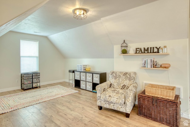 431 W 3460 N, Erda, UT 84074 - living area featuring vaulted ceiling, wood finished floors, and baseboards