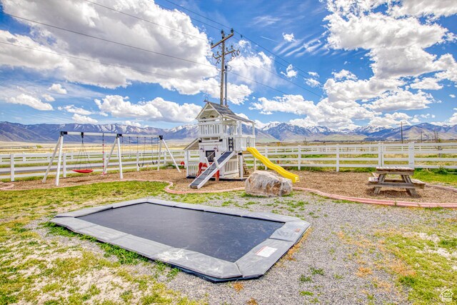 431 W 3460 N, Erda, UT 84074 - view of yard with fence, a rural view, a mountain view, and a playground