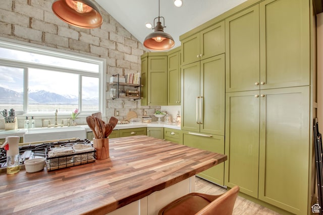 431 W 3460 N, Erda, UT 84074 - kitchen featuring green cabinetry, paneled built in refrigerator, and butcher block counters