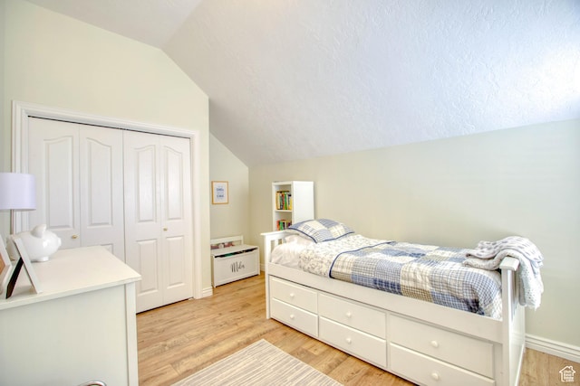 431 W 3460 N, Erda, UT 84074 - bedroom with a closet, light wood-style flooring, lofted ceiling, and baseboards