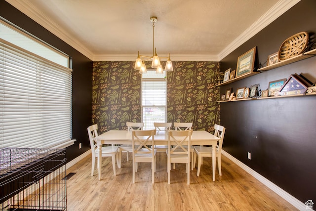 431 W 3460 N, Erda, UT 84074 - dining room with crown molding, an inviting chandelier, wallpapered walls, and wood finished floors