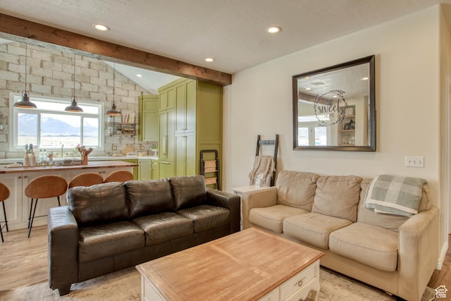 431 W 3460 N, Erda, UT 84074 - living area with recessed lighting, lofted ceiling with beams, a healthy amount of sunlight, and light wood-style floors