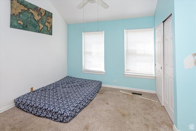 1381 W Beacon Hill Dr S, Taylorsville, UT 84123 - carpeted bedroom with baseboards, a ceiling fan, and a closet
