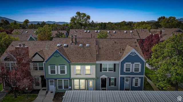 view of front of property with a mountain view