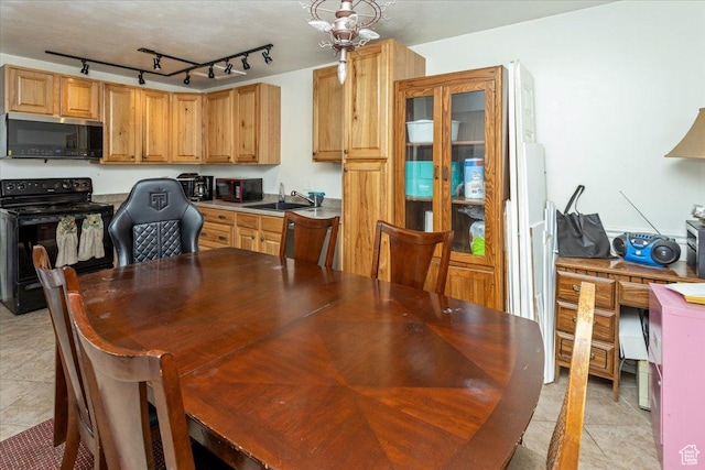 1381 W Beacon Hill Dr S, Taylorsville, UT 84123 - dining room featuring light tile patterned floors