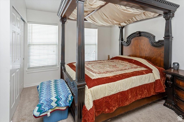 1381 W Beacon Hill Dr S, Taylorsville, UT 84123 - bedroom with carpet, multiple windows, and baseboards