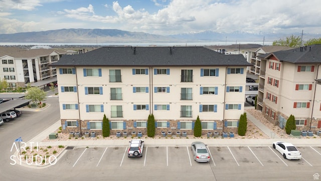1004 N 1090 W Unit 401, Orem, UT 84057 - view of building exterior featuring uncovered parking and a mountain view
