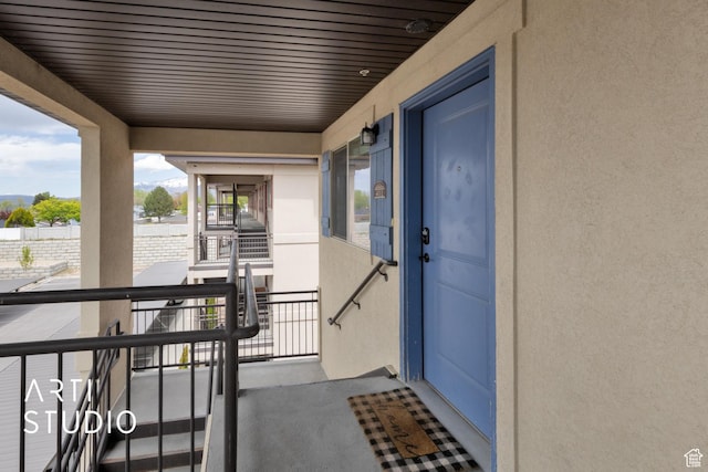 1004 N 1090 W Unit 401, Orem, UT 84057 - view of exterior entry with stucco siding and a balcony