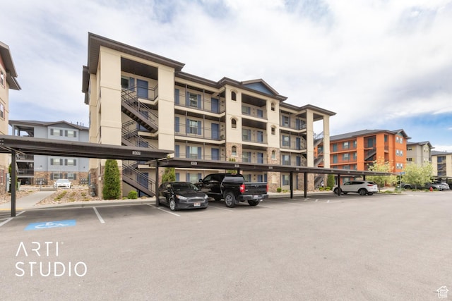 1004 N 1090 W Unit 401, Orem, UT 84057 - view of building exterior featuring covered parking