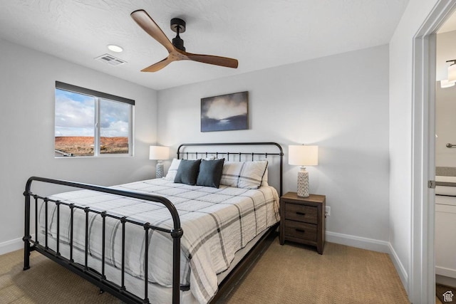 1378 N Marfil Way, Washington, UT 84780 - carpeted bedroom with ensuite bathroom, visible vents, ceiling fan, and baseboards