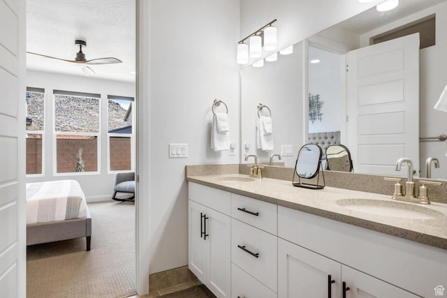 1378 N Marfil Way, Washington, UT 84780 - bathroom with double vanity, ceiling fan, ensuite bath, and a sink