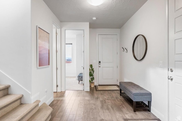 1378 N Marfil Way, Washington, UT 84780 - foyer with light wood finished floors, stairs, and baseboards