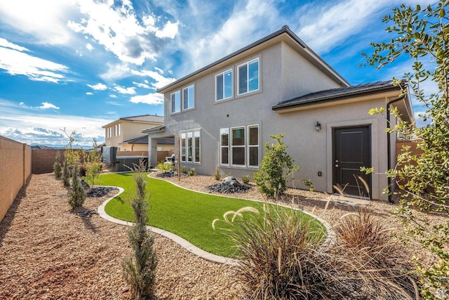1378 N Marfil Way, Washington, UT 84780 - rear view of property featuring a fenced backyard, stucco siding, and a yard