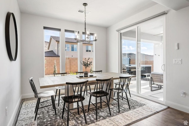 1378 N Marfil Way, Washington, UT 84780 - dining area featuring baseboards, visible vents, hardwood / wood-style flooring, and a chandelier