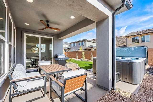 1378 N Marfil Way, Washington, UT 84780 - view of patio / terrace with area for grilling, outdoor dining area, a hot tub, ceiling fan, and a fenced backyard