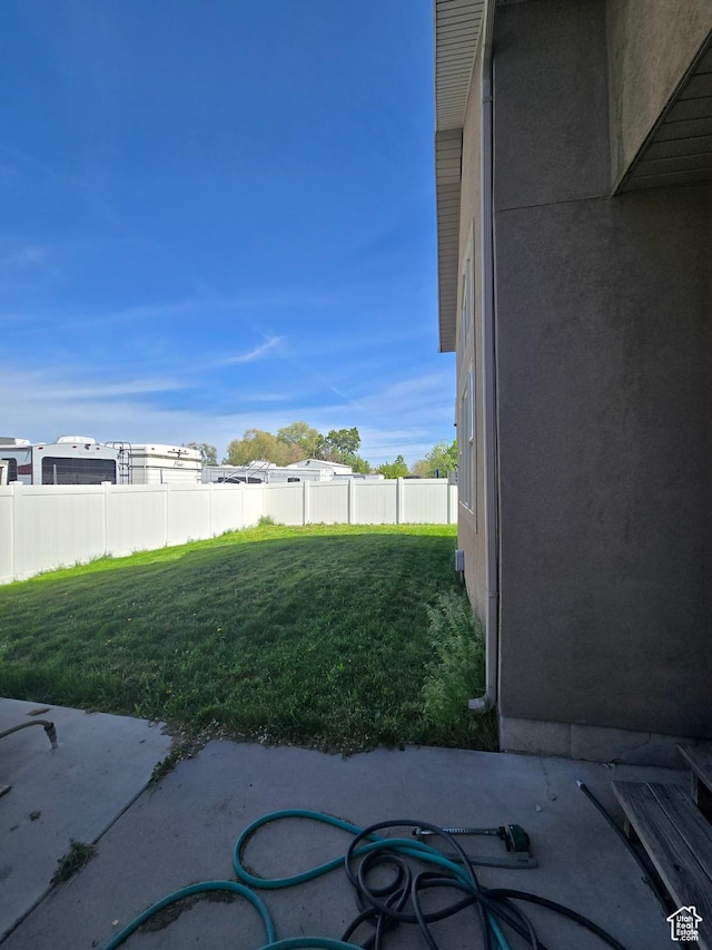 5564 S Yellow Fin Way W, Murray, UT 84107 - view of yard featuring fence and a patio area