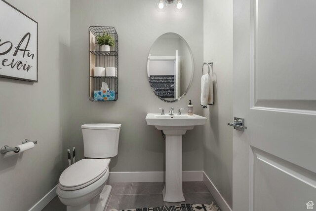 4772 W Thorntree Ln, Herriman, UT 84096 - half bath featuring toilet, tile patterned floors, and baseboards