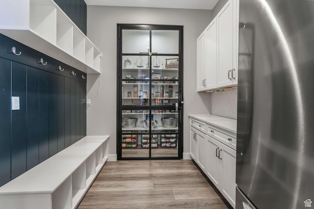4772 W Thorntree Ln, Herriman, UT 84096 - mudroom featuring light wood-type flooring