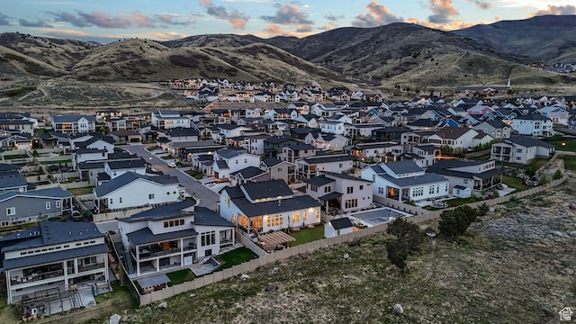 4772 W Thorntree Ln, Herriman, UT 84096 - aerial view at dusk featuring a mountain view and a residential view